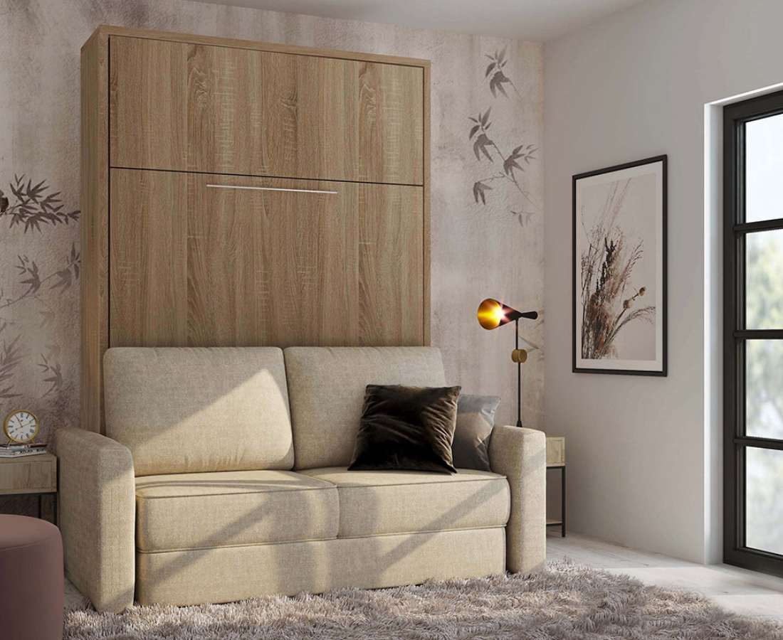 Notre lit escamotable FIDJI SOFA vertical. Avec son canapé intégré il est incontournable pour optimiser votre intérieur et transformer votre pièce en chambre ou salon. Le lit escamotable Fidji sofa est personnalisable comme toute notre gamme, le canapé possède un coffre de rangement très pratique pour votre couette et vos oreillers. Et des variation sur le choix du tissu. Vous pouvez ajouter des éléments comme des colonnes étagères, tiroirs ou dressing, des filers pour la finition sont disponibles, n'hésitez pas à nous contacter pour plus d'informations, nous aurons plaisir à vous accompagner dans votre projet.
